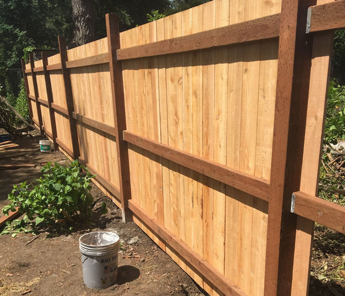 new wood privacy fence being installed